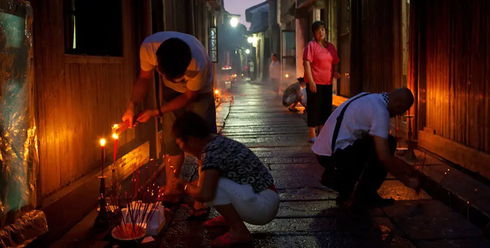 Burning incenses during the Hungry Ghost Festival